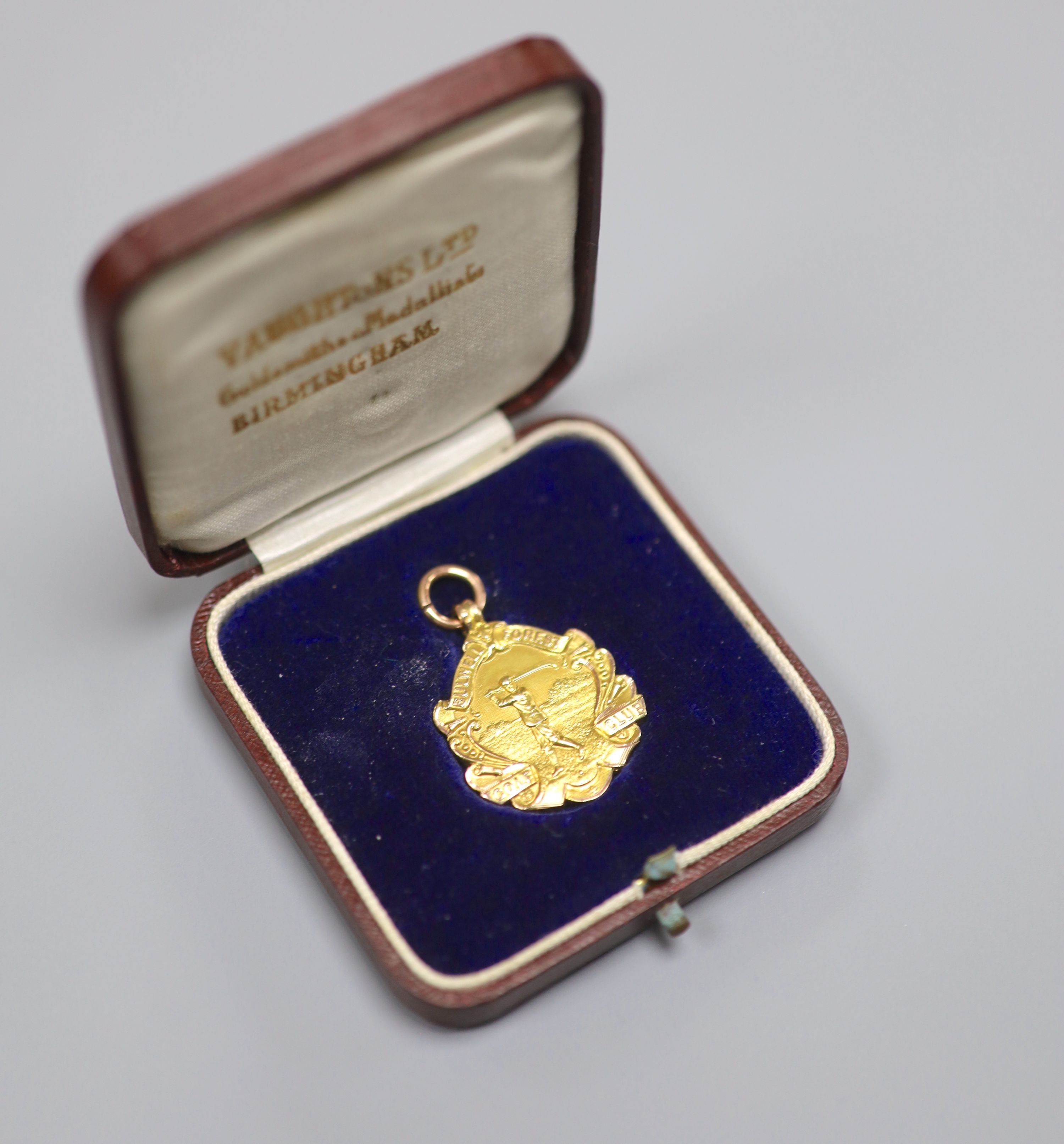 A cased George V Bulwell Forest Golf Club two colour 9ct gold presentation medal, Vaughton & Sons, Birmingham, 1921,